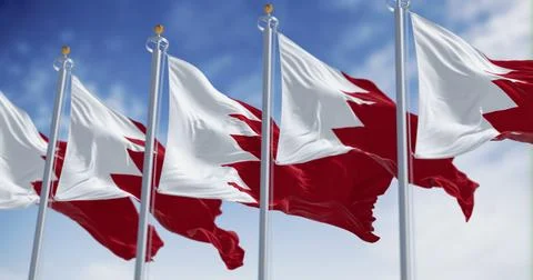 Bahrain flags waving on a clear day Stock Illustration