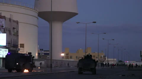 Bahrain shia protesters use molotov against police Stock Footage 59572669