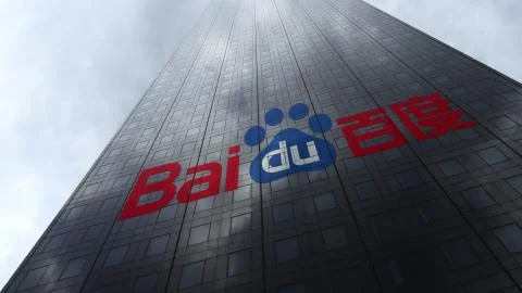 Baidu logo on a skyscraper facade reflecting clouds. Editorial 3D rendering Illustrazione stock