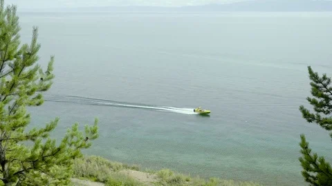 Baikal lake view. Panoramic view of great lake. Pleasure boats swimming in the Stock Footage 79915170