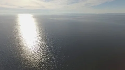 Baikal water - very high fly to reflection of the sun Stockbeeldmateriaal 80554203