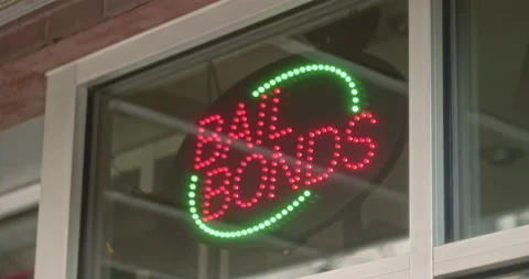 Bail Bonds Neon Sign Rack Focus 動画素材 230040001