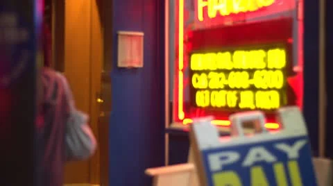 Bail bonds storefront at night Stock Footage 10589986