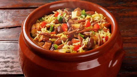 Baio de Dois in a ceramic casserole, a typical dish of Brazilian northeaste.. Stock Footage 334354394