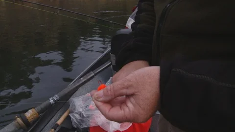 Baiting a hook Stock Footage 116908164