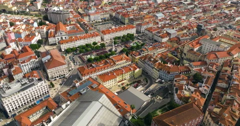 The Baixa District's Highlights Include Rossio Square, a Vibrant Landmark in Stock Footage 296215501