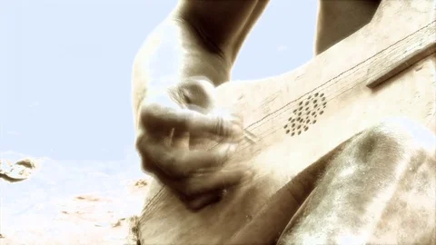 Baka Pygmy man playing a handmade guitar Stock Footage 81054355