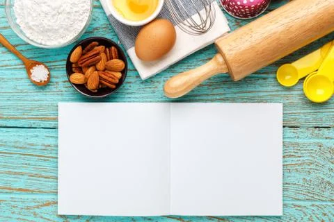 Bake background with notebook and baking ingredients Foto stock