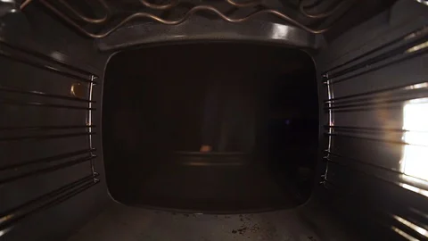 Bake bread in the oven. Close up Stock Footage 99632022