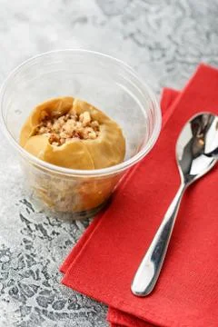 Baked apple with nuts Stock Photos