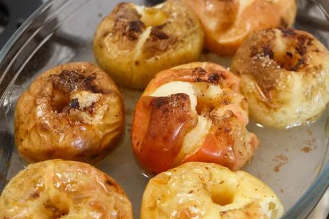 Baked apples in a dish Stock Photos