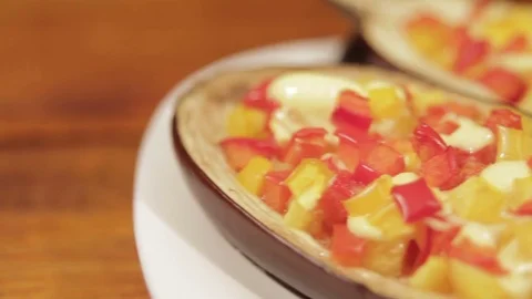 Baked aubergines stuffed with cheese and vegetables Stock Footage 71773553