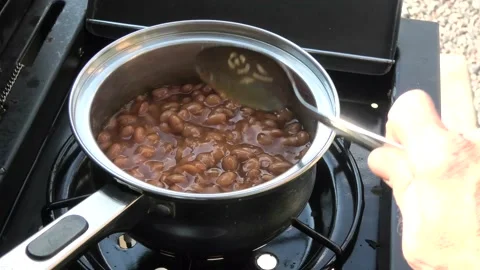 Baked Beans Heated on a Grill Stock-Footage 146045270