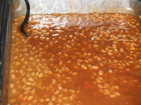 Baked Beans in a serving pan Stock Photos