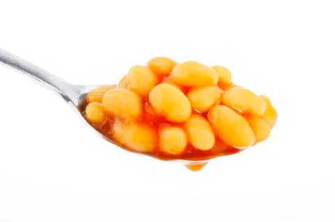 Baked beans in spoon Stock Photos