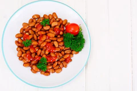 Baked Beans with Tomato Paste and Parsley Stock Photos