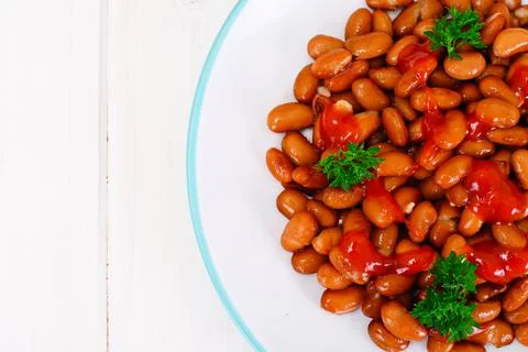 Baked Beans with Tomato Paste and Parsley Stock Photos