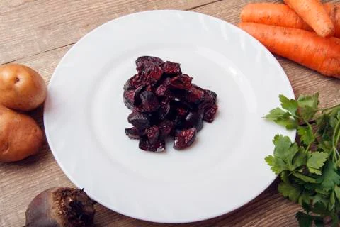 Baked beetroot for a vegetable salad. Stock Photos