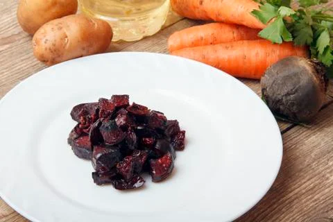 Baked beetroot for a vegetable salad. Stock Photos