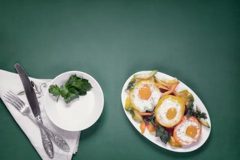 Baked bell pepper with egg inside the pepper Stock Photos
