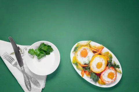 Baked bell pepper with egg inside the pepper Stock Photos
