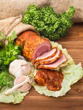 Baked boiled pork with greenery Stock Photos