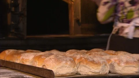 Baked bread and bakers Stock Footage 87744268