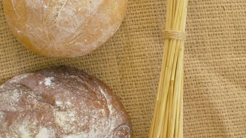 Baked bread and wheat ears Stock Footage 137032173