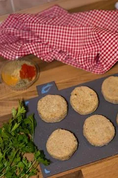 Baked bread rolls on a baking tray with herbs and sauce 스톡 사진
