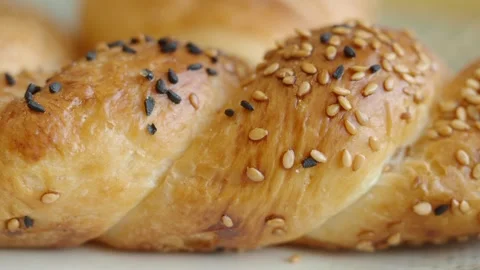 Baked bread with sesame seeds from local bakery Stock Footage 340598178