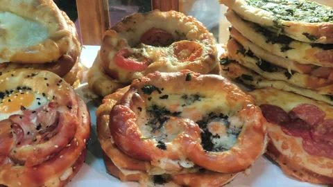 Baked bread stuffed with spinach and melted cheese 스톡 동영상 318352732