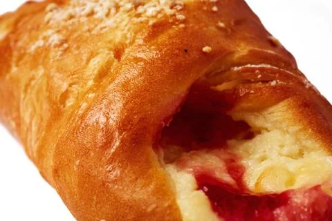 Baked bun with jam isolated on white background. Stock Photos