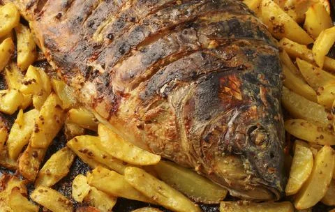 Baked carp Stock Photos