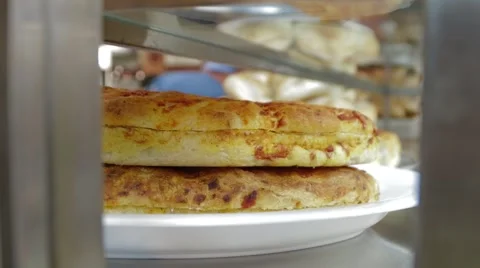 Baked Cheese Rolls on Display Video stock 42710939