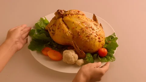 Baked chicken dish with fresh vegetables take away by the hands of a young girl Stock Footage 119494232