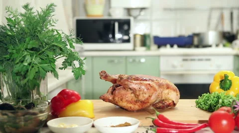 Baked chicken on the kitchen table Stock Footage 47570980