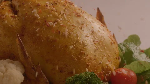 Baked chicken sprinkled with spices Stock Footage 91921069