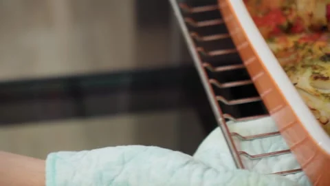 Baked cod fish served in bowl. Cooking fish in the oven. Selective focus. Stock Footage 245998006