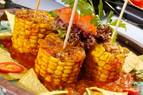Baked corn with salsa Stock Photos