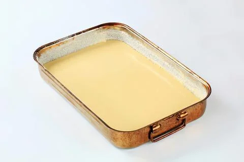 Baked dish in copper baking tray Stock Photos