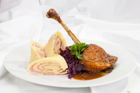Baked duck leg Stock Photos