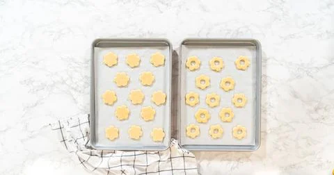 Baked Easter Flower Cookies on Baking Trays Stock Photos