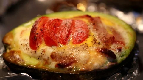 Baked Eggs in Avocado Stock Footage 74595647