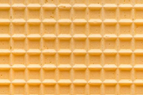Baked empty golden waffle,  background for your design, close up Stock Photos