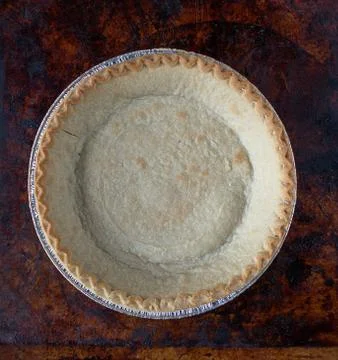 Baked empty pie shell flat lay Stock Photos