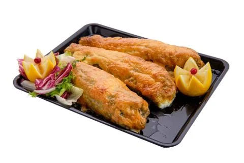 Baked fish in batter on tray isolated on white Foto stock