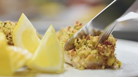 Baked fish with bread crumbs. Stock Footage 153457648