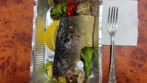 Baked fish with grilled vegetables Stock Footage 210013828