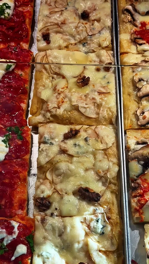 Baked flatbread cheese and spice entice, ready for a hot gourmet slice Stock Footage 337495690