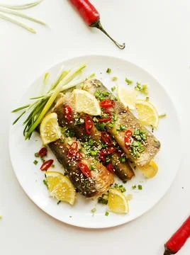 Baked hake fish Stock Photos
